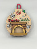 Wooden Santa fireplace ornament for counting down the days until Christmas